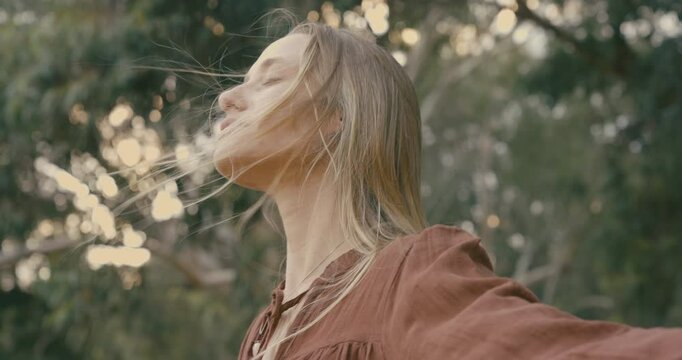 Woman breathing fresh air outdoors