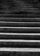 Concrete Staircase: Light and Shadow Patterns on a Sunny Day.