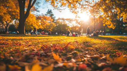 A lively autumn park scene with families enjoying the fall foliage, colorful leaves carpeting the ground, and a clear, sunny day.