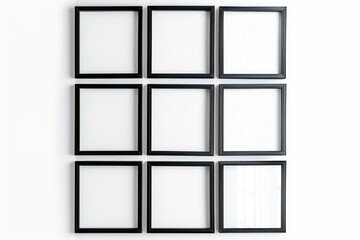 A collection of black picture frames hung on a wall, perfect for a minimalist decor or art display