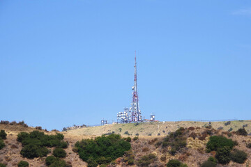 Communication antenna tower and equipment on a mountain top