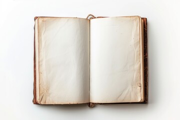 A single open book lying on a plain white surface
