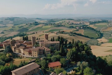 Fototapeta premium Aerial view of a small town surrounded by hills, suitable for travel or landscape photography