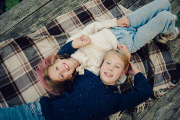 concept of dream about happy family and child. Happy children in autumn park