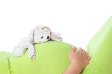 Happy pregnant girl lies on white background