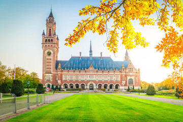 green grass lane in front of palace of peace in The Hague, Netherlands at fall