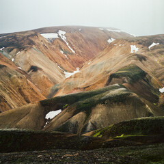 Colorful mountain in Iceland with glaciers and moss