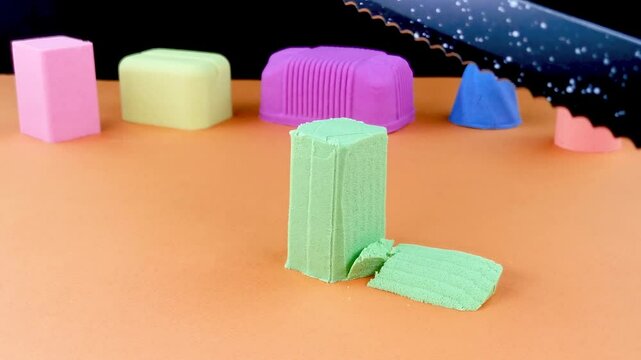 Very Satisfying and Relaxing Kinetic Sand ASMR video. Cutting anti stress macro close up colorful Kinetic Sand with a Knife. ASMR sounds.
