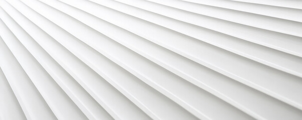 Obraz premium A white surface with a corrugated texture, featuring parallel ridges and grooves. The texture creates a dynamic, industrial feel with strong linear elements.
