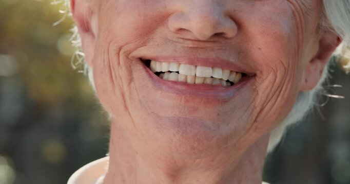 Elderly person, mouth and oral care in nature with smile, new dentures and pride for wellness. Senior woman, teeth and happy outdoor for retirement, healthcare or dental hygiene or veneers in closeup