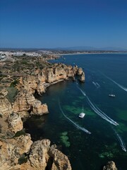 This aerial photo captures the stunning rock formations and turquoise waters at Ponta da Piedade in Lagos, Algarve. 