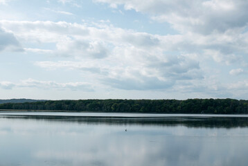 Scenery of the Kushiro River flowing calmly through the Kushiro Marsh in Hokkaido