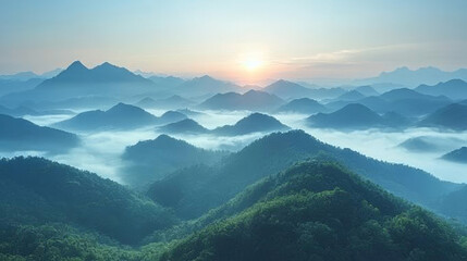 Naklejka premium A stunning sunrise over a mountain range, with soft blue hues and fluffy clouds.