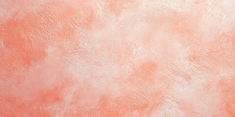 Fototapeta premium A light coral surface with a fine, stippled texture. The soft, warm hue combined with the delicate texture creates an inviting and visually pleasing background.