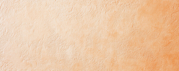A light pastel orange surface with a fine, stippled texture. The warm, cheerful hue and subtle texture add a cozy and inviting feel to the background.
