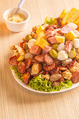 dish with onion, quail egg, pepperoni and cheese, meat
