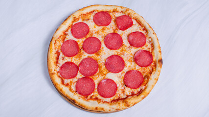 Pizza pepperoni top view isolated
