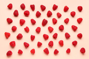Many fresh raspberries on pink background