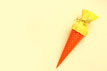 School cone on yellow background