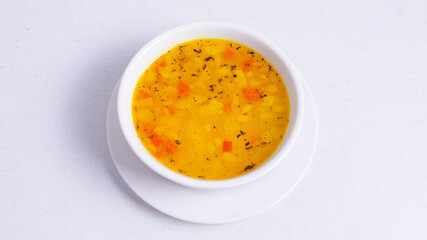 Chicken soup bowl top view isolated