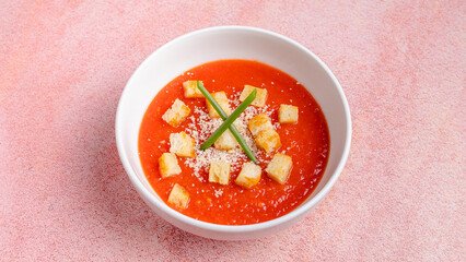 Tomato soup bowl with crackers