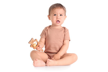 Cute baby with toy on white background