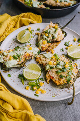Stuffed poblano peppers with cilantro lime sauce 
