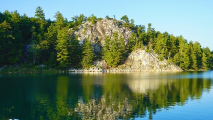 Early morning reflections in Covered Portage Cove, Georgian Bay near Killarney Park, Ontario