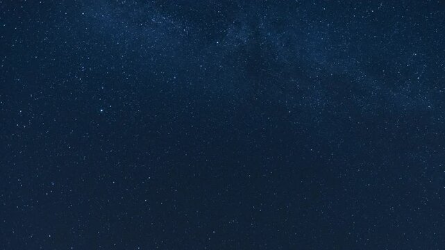 The Milky Way moving across the night sky. Captures the mesmerizing motion of stars and cosmic detail in a clear, dark sky