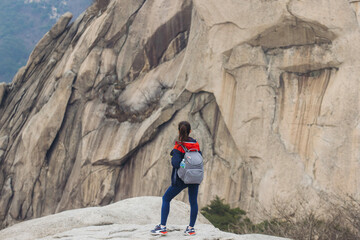 Bukhansan National Park, Seoul, Gyeonggi-do, South Korea, spring landscape view during hike to Baegundae summit peak, process of trekking and climbing to Bukhan mountain, travel and hiking in Korea