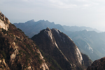 Bukhansan National Park, Seoul, Gyeonggi-do, South Korea, spring landscape view during hike to Baegundae summit peak, process of trekking and climbing to Bukhan mountain, travel and hiking in Korea