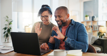 Couple, wave and laptop in home for video call, hello or communication on internet. People, happy or tech in living room for contact, connectivity or live streaming at table for distant family update