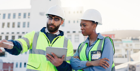 Business people, architect and planning construction with tablet on rooftop for building maintenance in city. Contractors, colleagues or civil engineers with technology for infrastructure in town