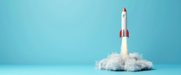 A rocket is flying through the air with a trail of smoke behind it