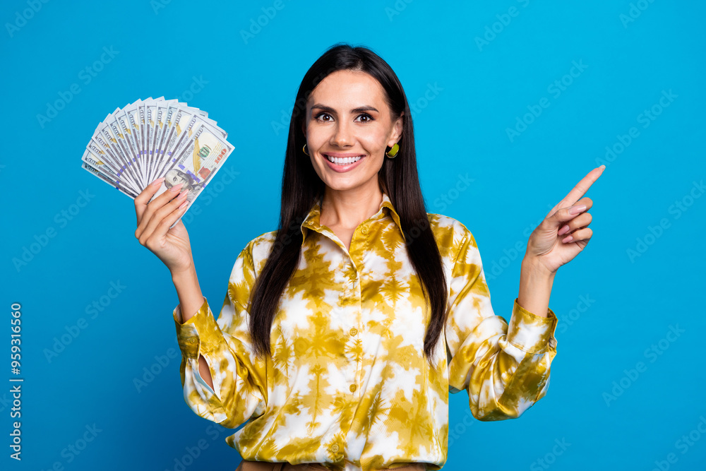 Wall mural Photo of lovely elegant successful woman wear trendy blouse salary deposit budget empty space isolated on blue color background