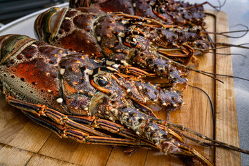 Food themes: Fresh lobsters on kitchen table.