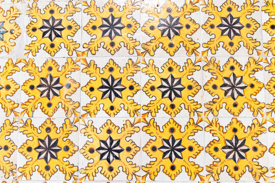 Tunis, Tunisia. Yellow decorative tiles on a house near the Tunis Souk.