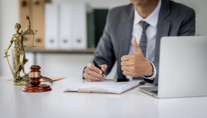 Close up of Judge gavel with Justice lawyers, Business senior man in suit or lawyer working on a documents. Legal law, advice and justice concept.
