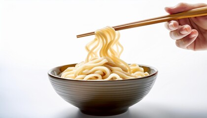 Udon with chopsticks on white background isolated