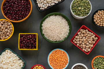 several pots with raw grains for preparing healthy food