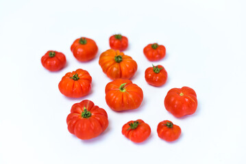 Beefsteak tomatoes, isolated on white. Top view and side view. Also call tomat labu in Indonesia