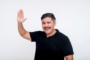 A middle aged man smiling while offering a hi-five to someone. Set against a white background.