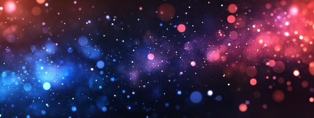 Abstract blue and red bokeh lights with dark background.