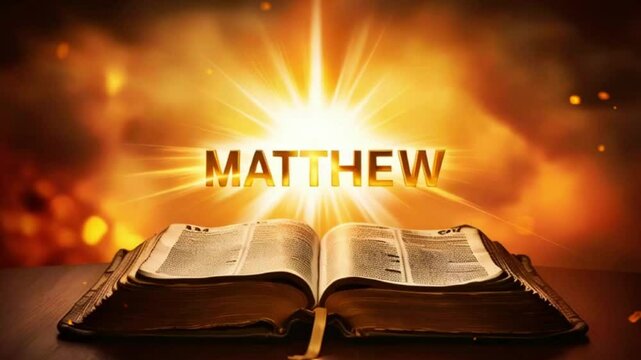 Open bible with golden rays and the word Matthew in a warm glow.