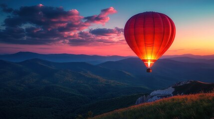 A vibrant hot air balloon soaring over scenic mountains at sunset.