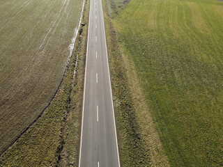 Naklejka premium Aerial view of a road in the countryside in spring