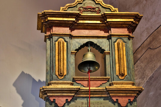 USA, California, Carmel. Inside the grounds at the Carmel Mission Basilica Museum metal bell