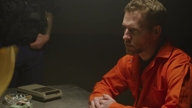 Jail inmate answering police questions