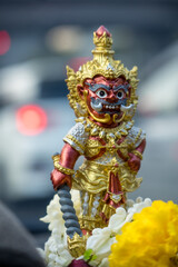 Close up view of Thai amulet religious Taowesuwan Bucha statue, worship the statue bring wealth protection lucky