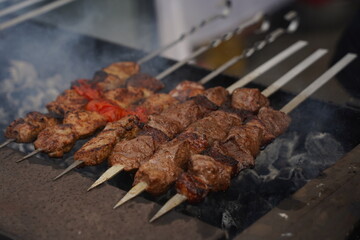 Roasting a barbecue on an open grill.